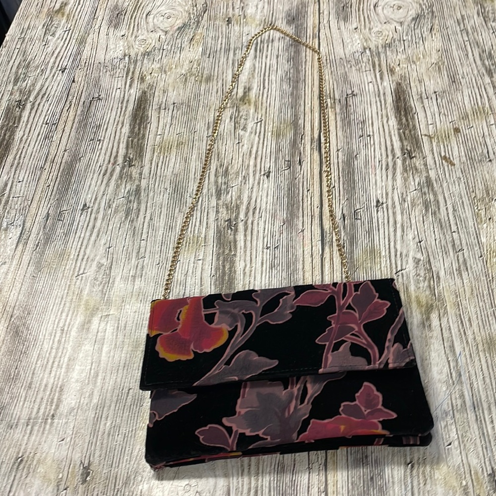 Black velvet floral clutch
